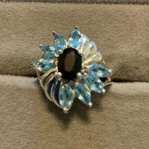 Elegant Sterling Silver and Blue Gemstone Flower Ring